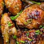 Close up on braised chicken thighs and drumsticks