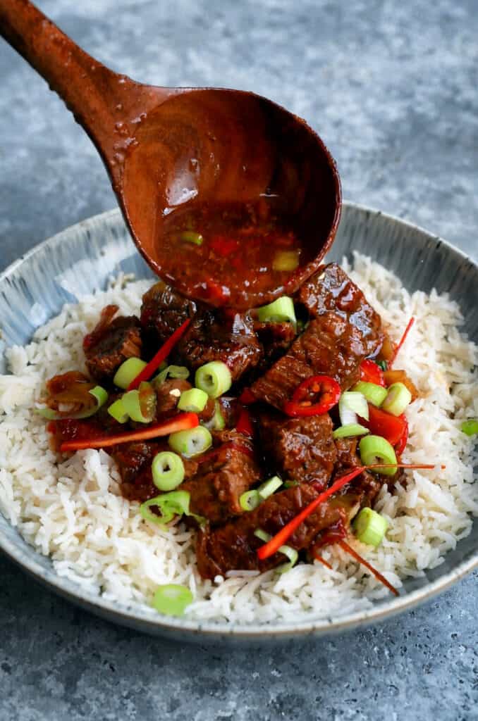 Bowl of Mongolian Beef over rice