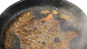 Deglazing hot pan with wine