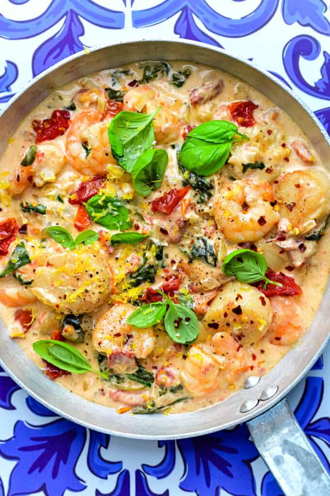 Tuscan Shrimp and Scallops in cream sauce in a pan