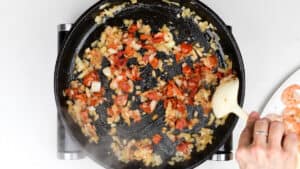 Pan frying shallots, garlic and sun dried tomatoes