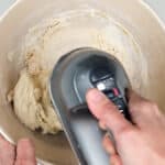 mixing dough with an electric hand mixer
