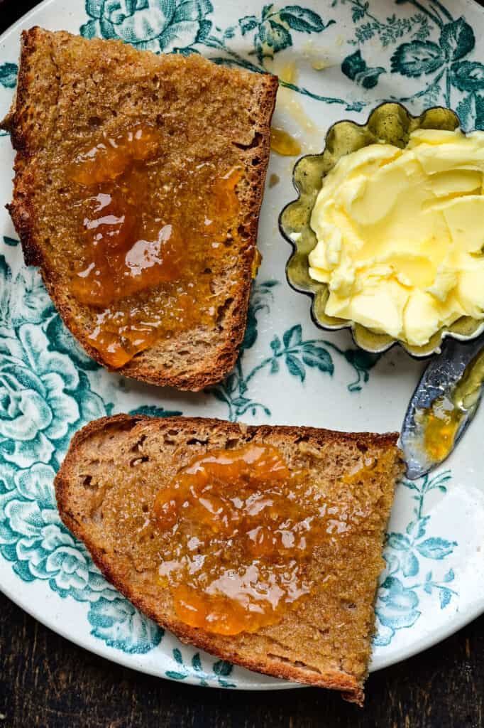 Whole wheat toasted bread spread with apricot jam