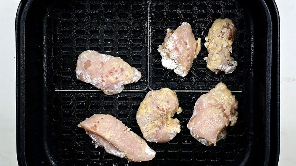 chicken pieces in an air fryer