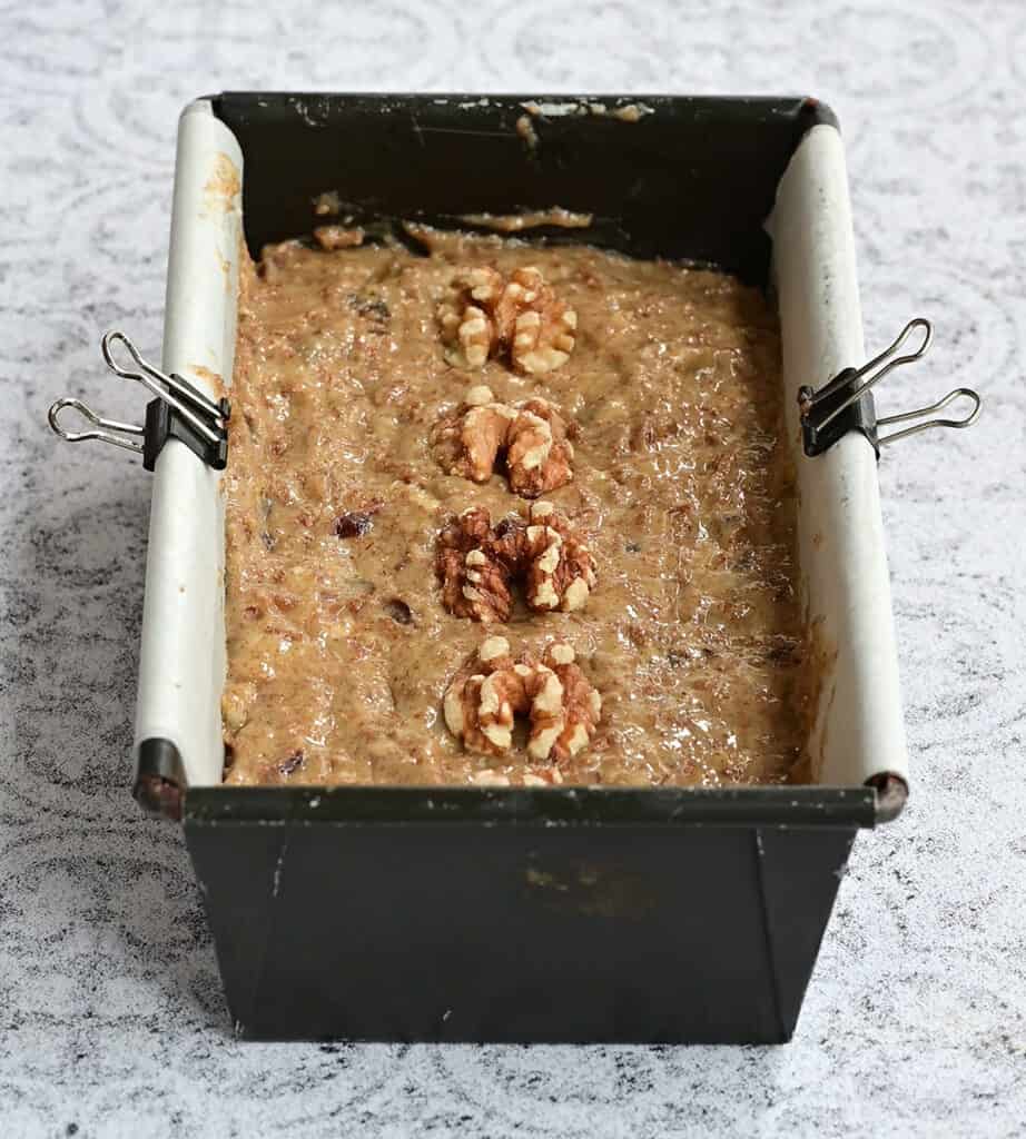 Fruit loaf in a loaf pan ready for the oven