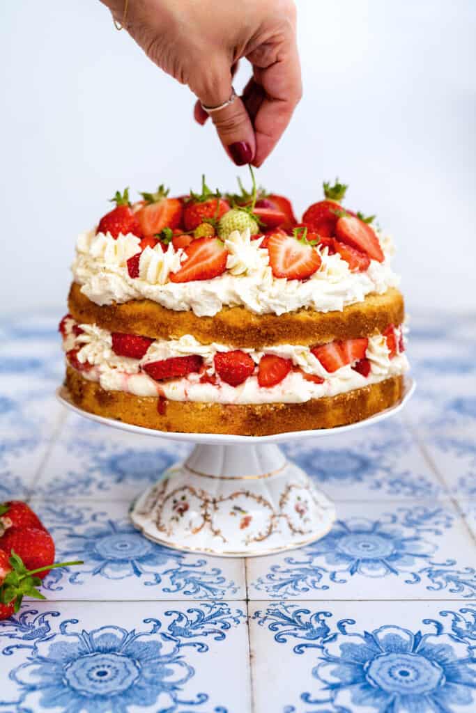 Strawberry shortcake on a cake stand