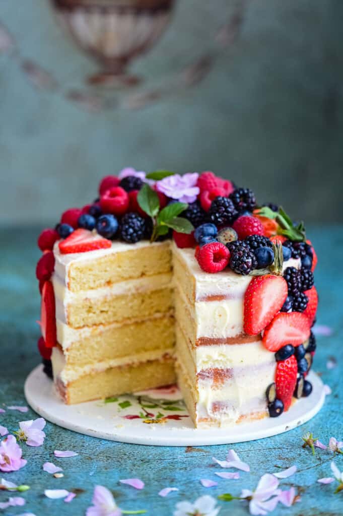Layered cake covered with fresh berries