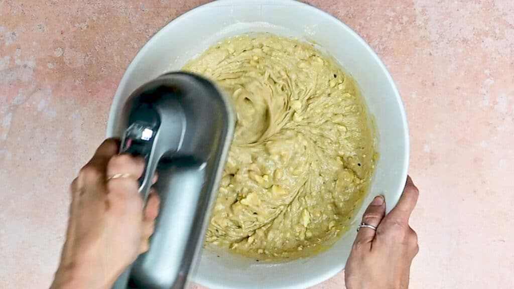 Beating cake batter with a hand mixer