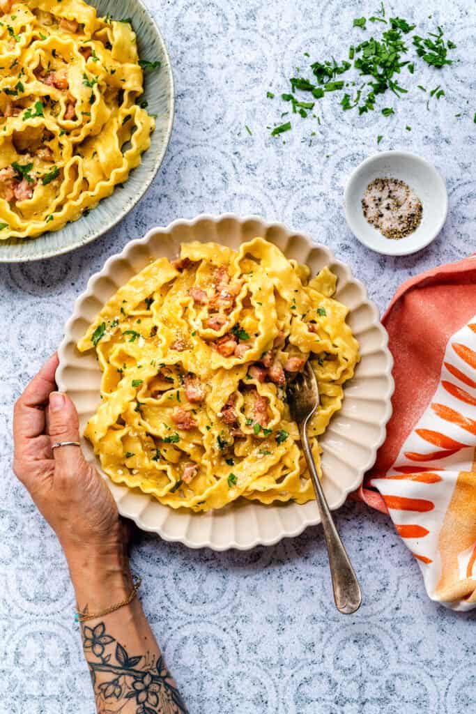 serving of pasta carbonara in bowls 