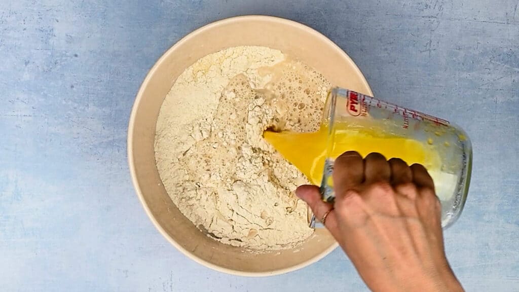 Combining Ingredients for Greek Country style bread in a bowl