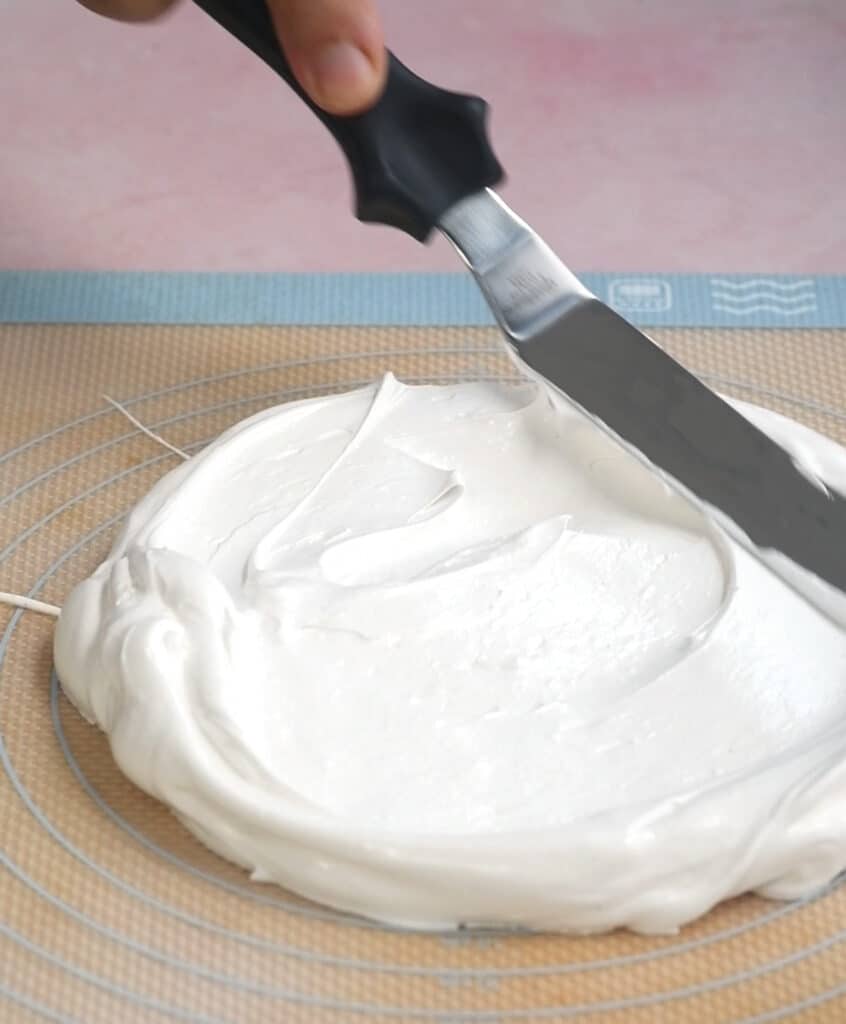 spreading meringue onto a slilicone mmat