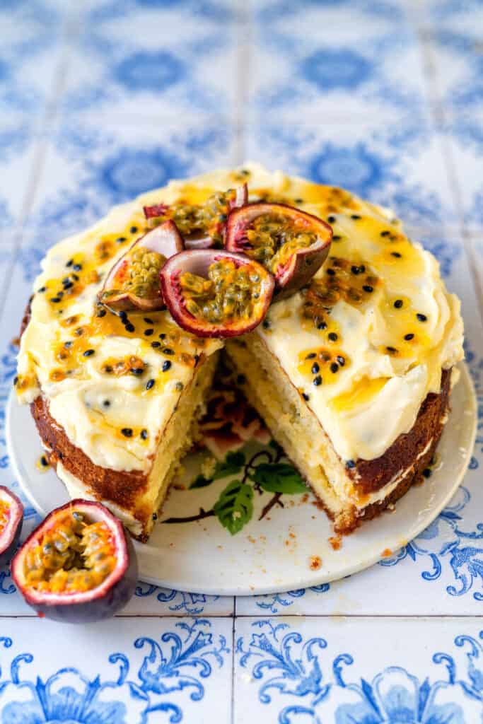 Fresh passionfruit cake with slice cut out