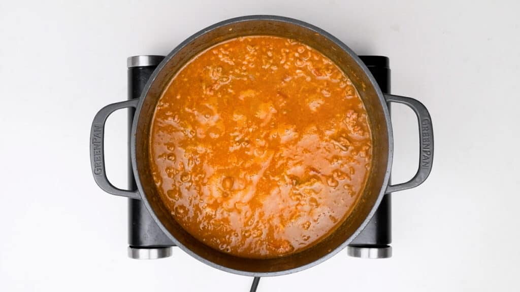 Greek Meat Sauce cooking in a pot