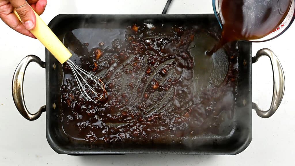 Making gravy in a roasting tin