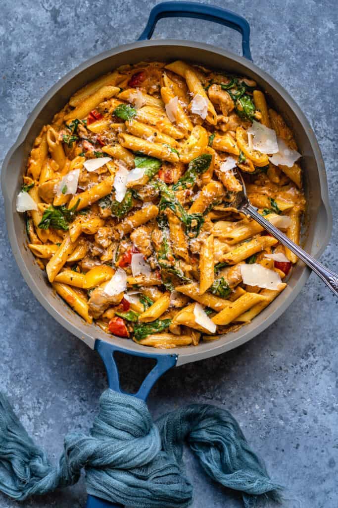 Tuscan chicken pasta in a pan