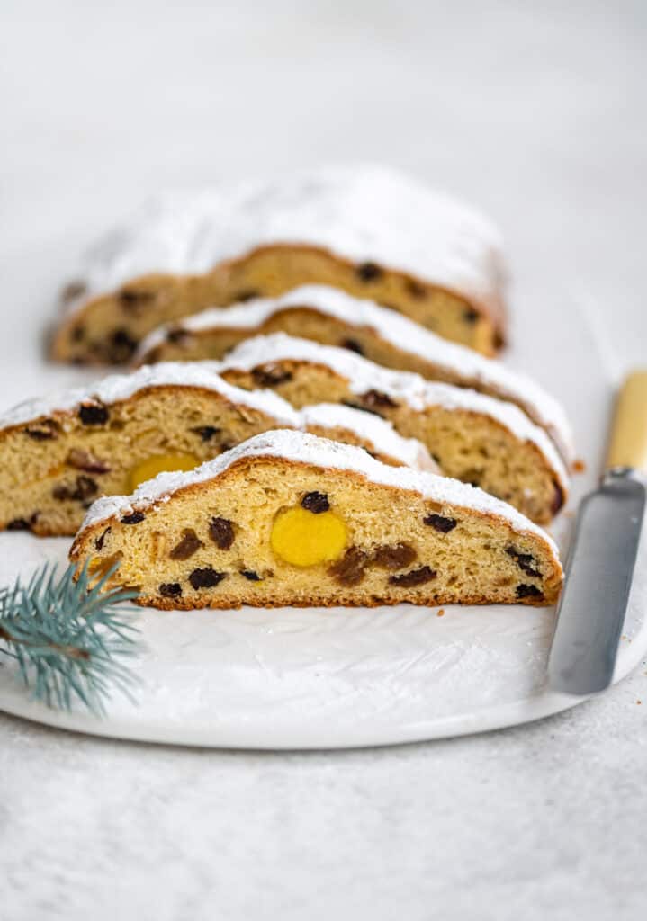 Christmas Stollen covered with powdered sugar, sliced 