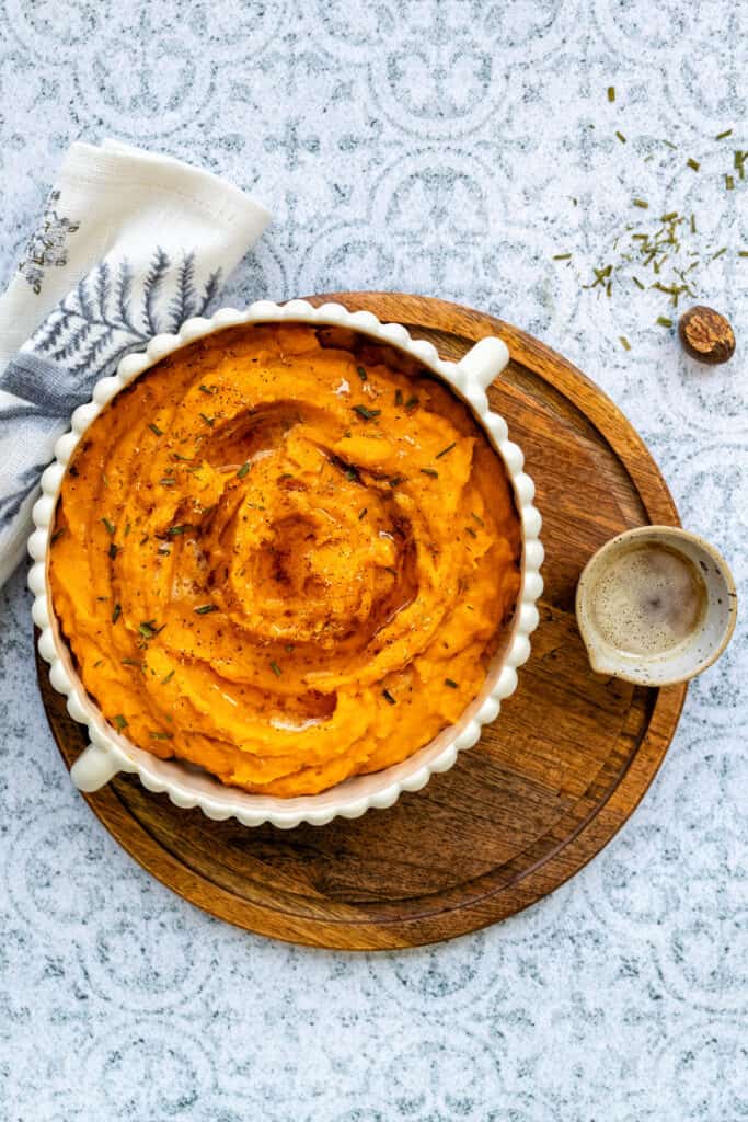 Bowl of mashed sweet potatoes with browned butter