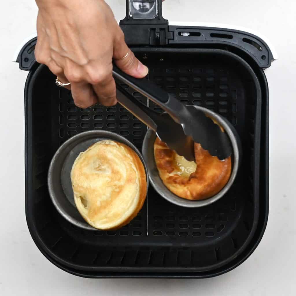 partially cooked air fried yorkshire puddings in Cosori air fryer basket