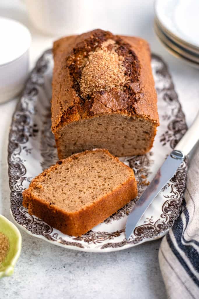 Loaf of banana bread with slice cut