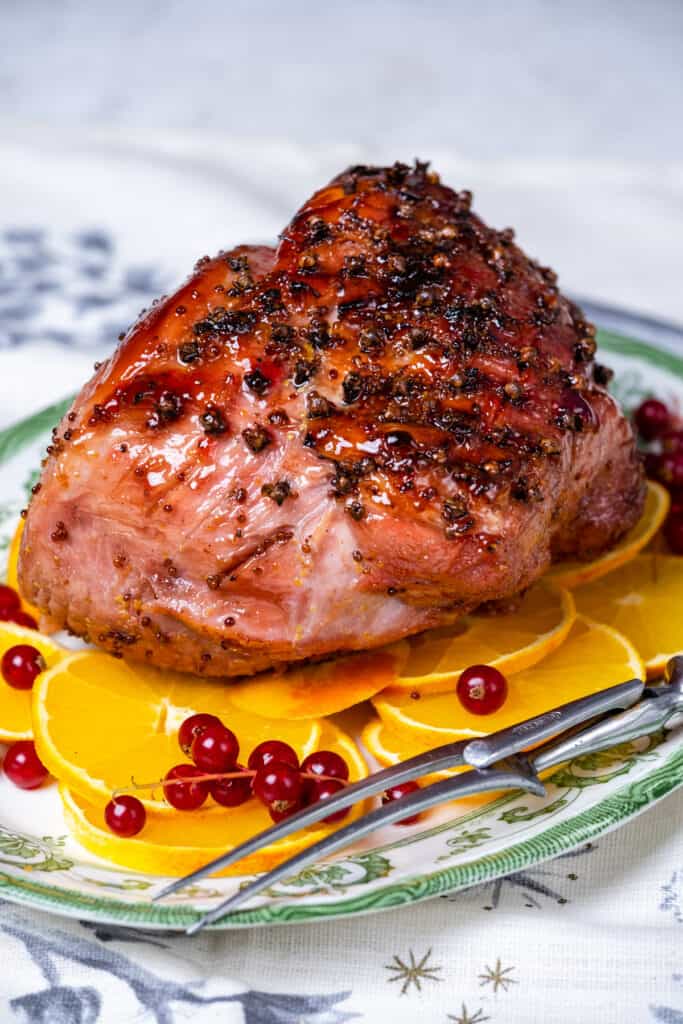 Glazed ham cooked in an air fryer on a pltter