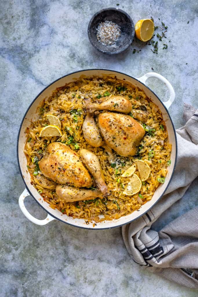 Casserole dish with poussin roasted with orzo