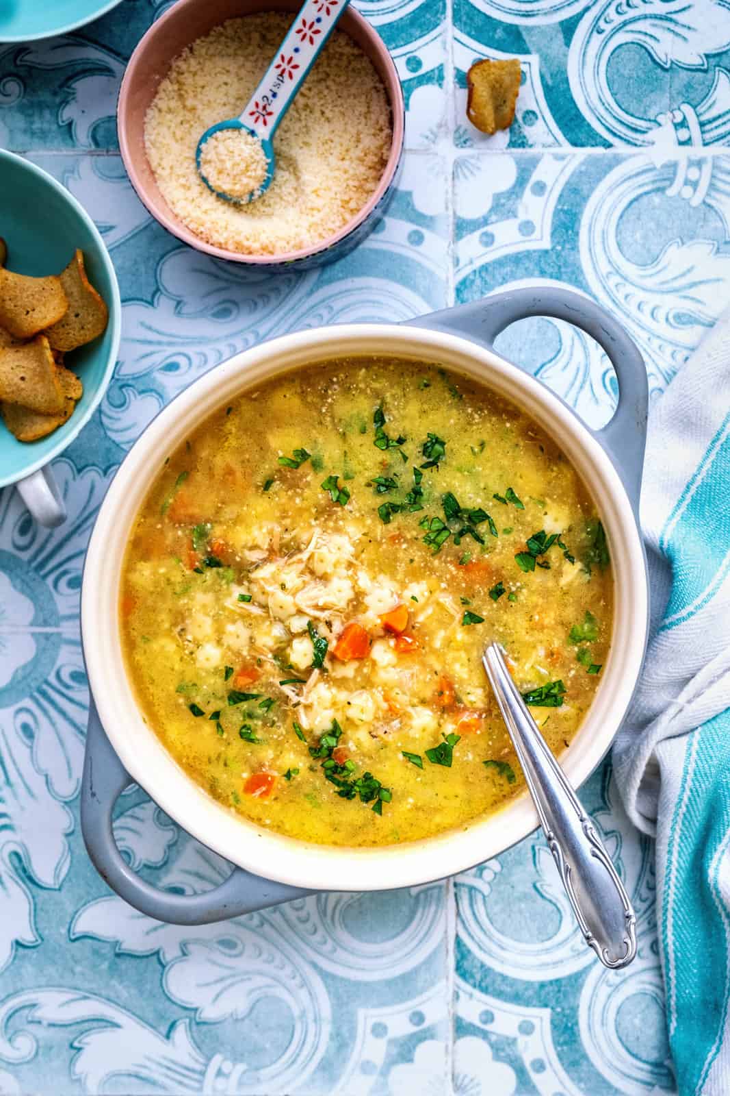 Overhead view of a pot of italian Chicken soup with pastina