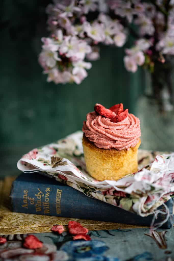 Air Fryer Vanilla Cupcake with strawberry frosting