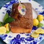 Drizzling lemon syrup over air fryer lemon drizzle cake