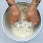 rubbing butter into flour in a bowl