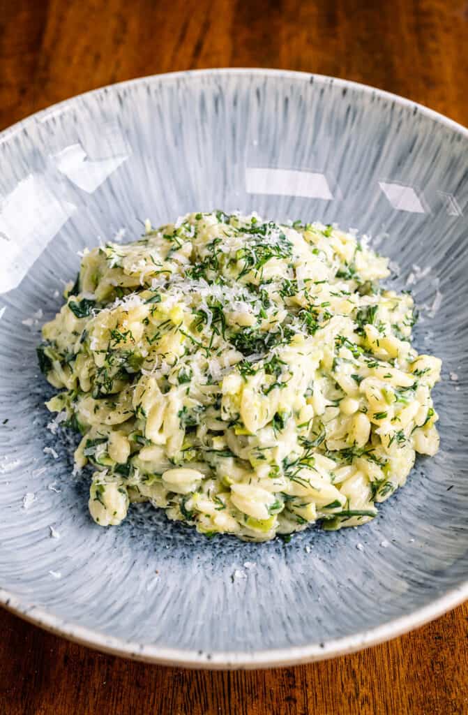 Creamy spinach orzo in a bowl
