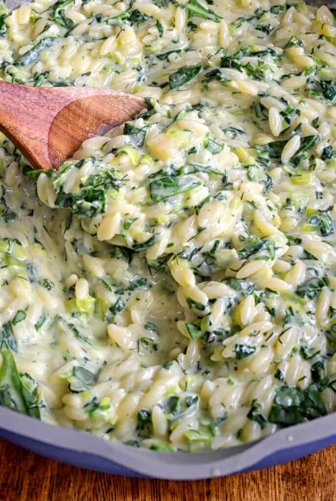 Spinach orzo in a pan