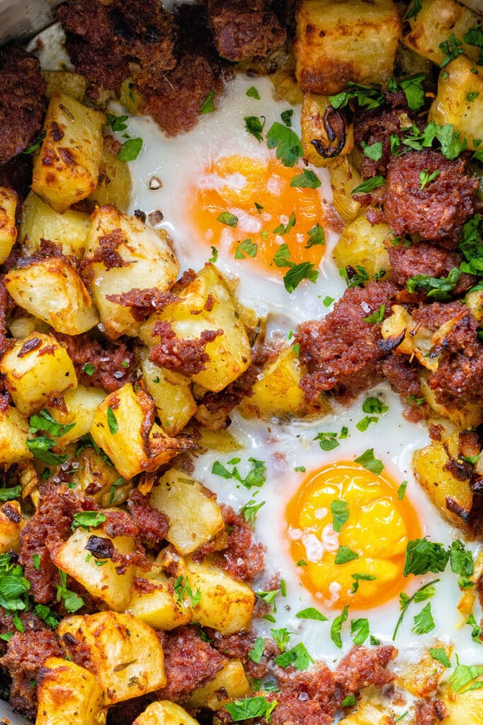 close up on corned beef hash with eggs