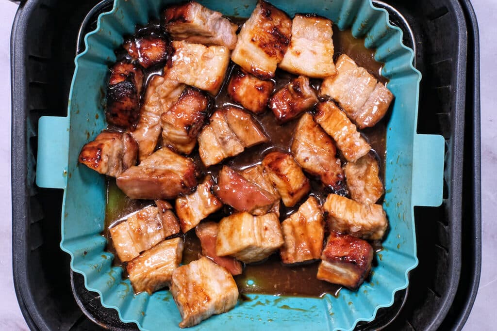 marinated pork belly cubes in a silicone liner 