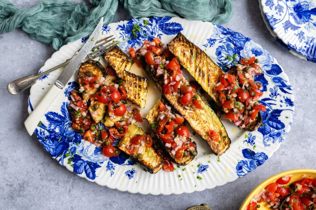 Air Fryer Roasted Zucchini, Thomas Keller style, with sauce vierge on a platter