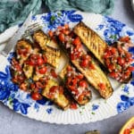 Air Fryer Roasted Zucchini with sauce vierge on a platter