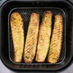 air fried zucchini in the basket of air fryer