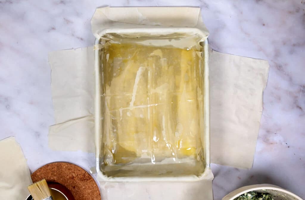 covering pan with phyllo pastry