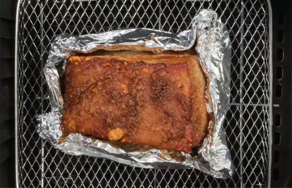Air Fryer Pork Belly, cooked, flesh wrapped with foil
