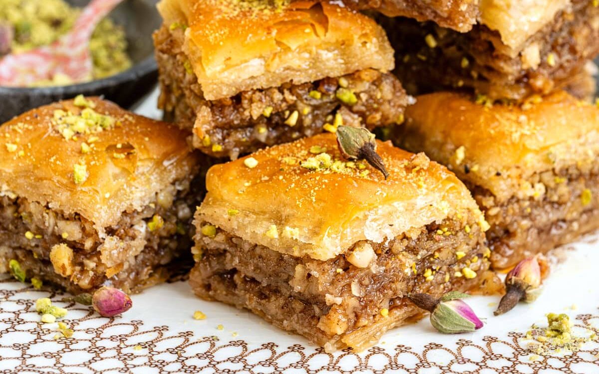plate with pieces of homemade baklava, close up