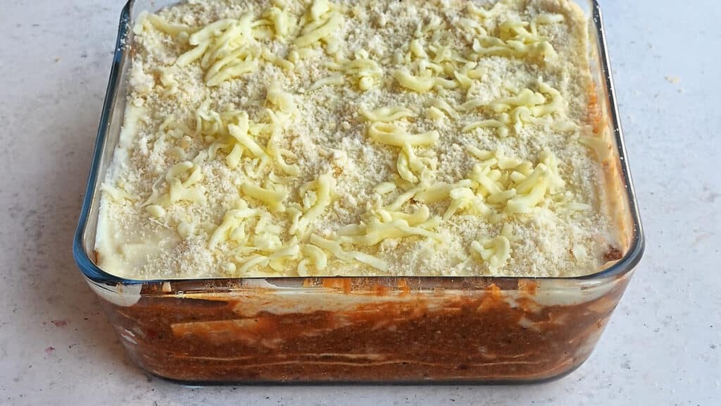 lasagna dish topped with cheese