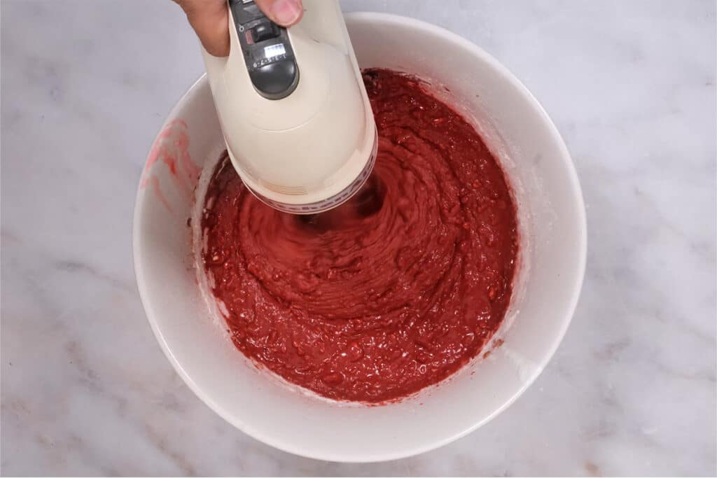 mixing red velvet cake batter