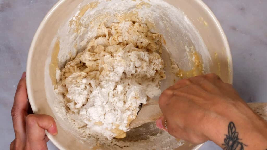 mixing TIger bread dough in a bowl