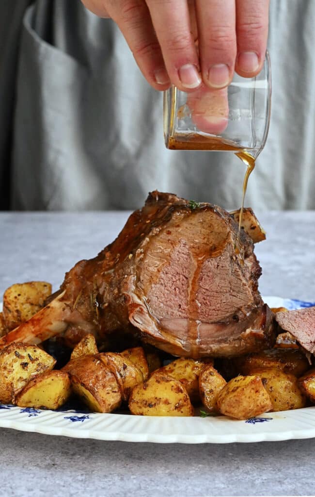 drizzling half leg of lamb with olive oil