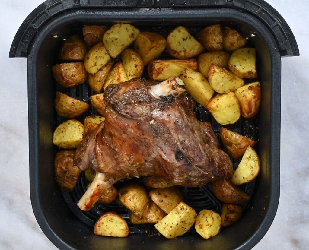 Greek leg of lamb cooked in the air fryer with roast potatoes