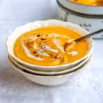 Air fryer butternut squash soup in a bowl with soup on the side