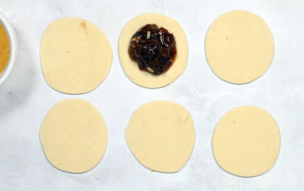puff pastry circles, one with mincemeat filling