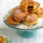 puff pastry mince pies on a cake stand