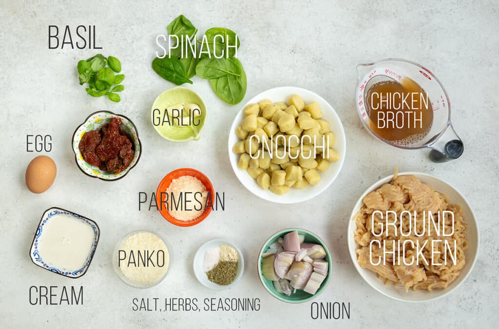 ingredients for slow cooker chicken meatballs in creamy Tuscan sauce with captions