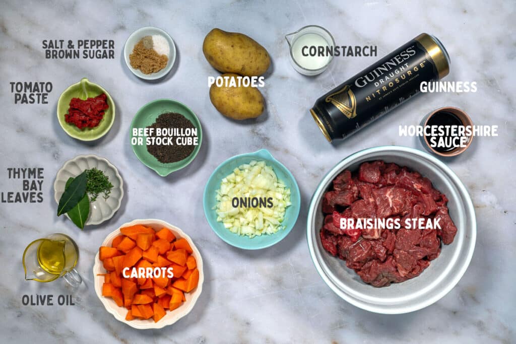 beef stout pie ingredients laid out with captions on top