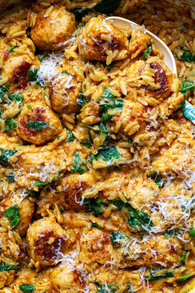 Close up on Marry Me chicken meatballs with orzo pasta